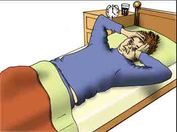 A man is twisting and turning in bed with insomnia.