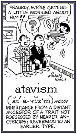 A little boy is behaving like a monkey swinging from the ceiling light.