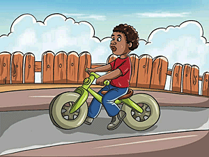 A child is progressing on a velocipede.