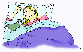 A woman is just falling asleep after reading in her book.